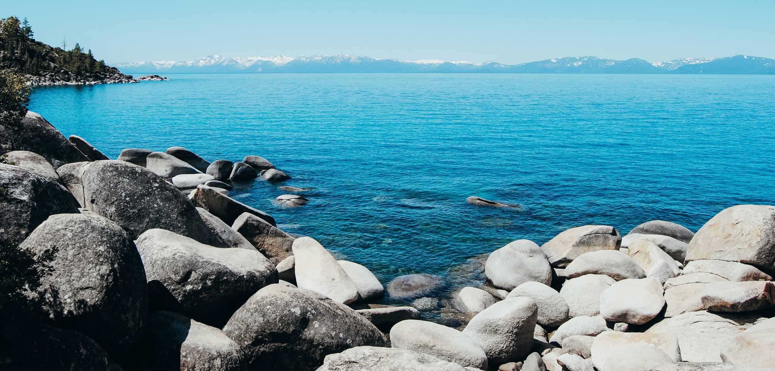 Lake Tahoe with rocky surroundings.