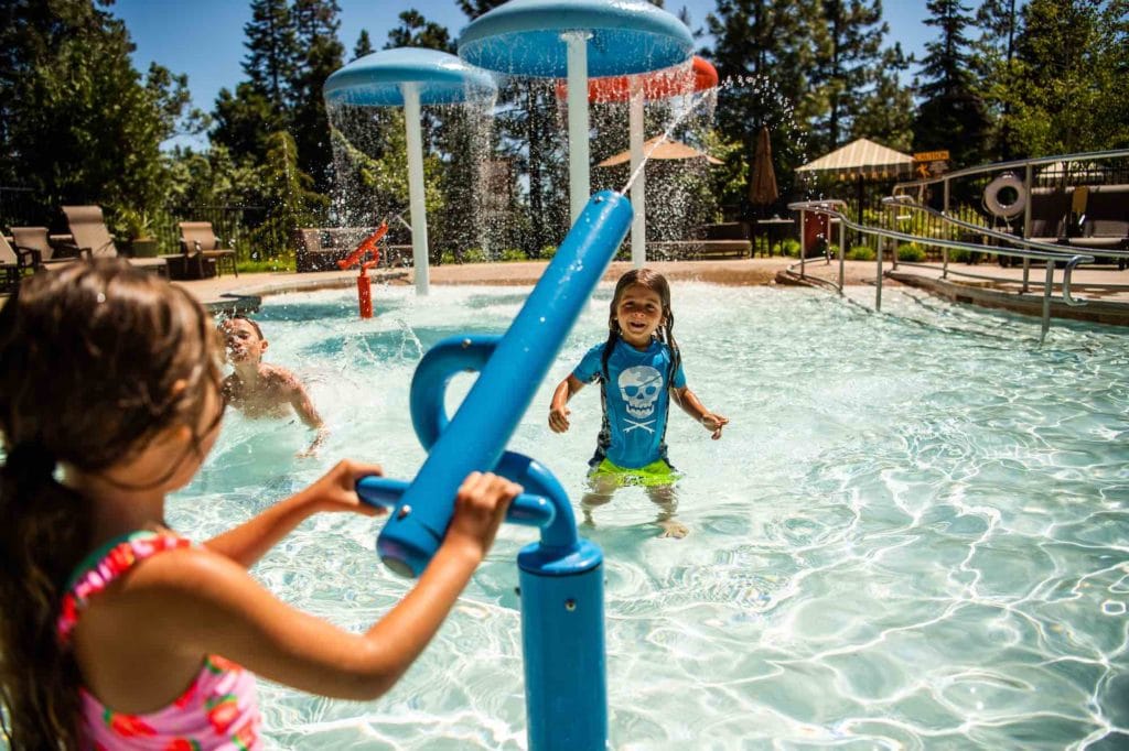 Kids playing in pool at Tenaya Lodge.