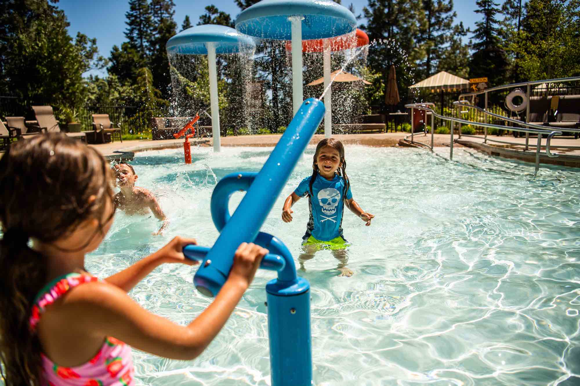 Kids playing in pool at Tenaya Lodge.