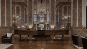 A vibrant dog park bathed in sunlight features abundant greenery with mature trees, offering ample shade for leisurely outdoor activities. In the distance is a well-equipped playground that presents an additional activity area. An inviting picnic table spreads out nearby, ideal for enjoying meals al fresco or taking relaxing breaks from play. A neatly-placed trash bin aids in maintaining the park's cleanliness for everyone's enjoyment. Dominating the scene is a generously wide dirt path gracefully curving through the expanse of grass, promising exploratory walks and lively fetch games.